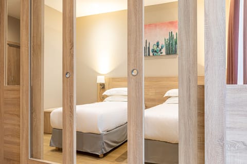 Family Quadruple Room | In-room safe, desk, soundproofing, iron/ironing board