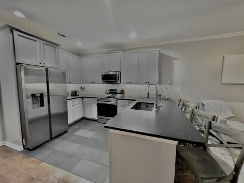 Large Kitchen/Living/Dining area perfect for entertaining.