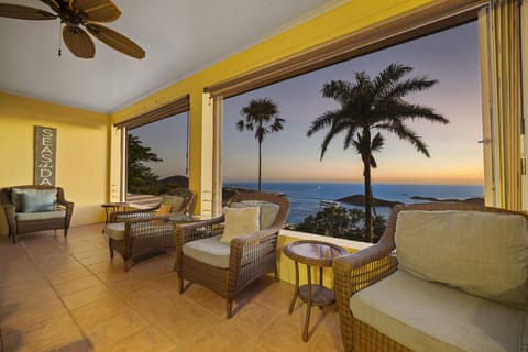 The main level`s covered balcony overlooking the pool deck and the Charlotte Amalie Harbor!