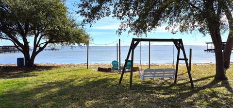 Great to sit around the fire pit, watch the lake, and just relax! 