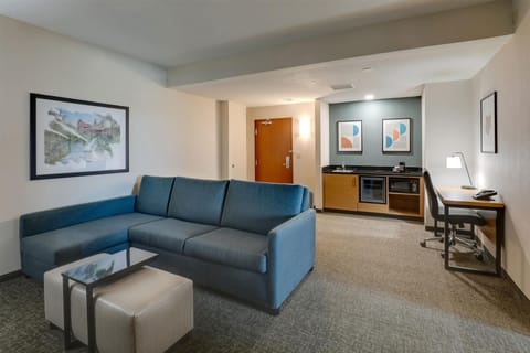 Desk, blackout drapes, iron/ironing board, free cribs/infant beds