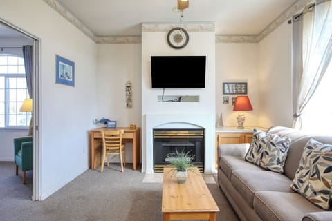 Welcome to Seaside Setting, Unit 109! Your breezy upstairs one-bedroom beach retreat features a comfy king bed and a sleeper sofa for extra guests. Kick back in the full kitchen, perfect for whipping up seaside snacks after a day on the sand.