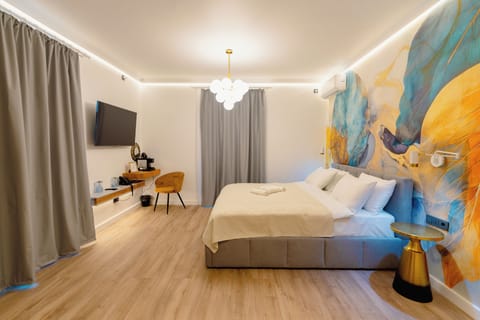 Deluxe Double Room, Garden View | In-room safe, blackout drapes, soundproofing