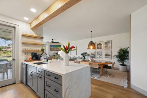 Cook, dine and unwind in this beautifully designed open-concept kitchen