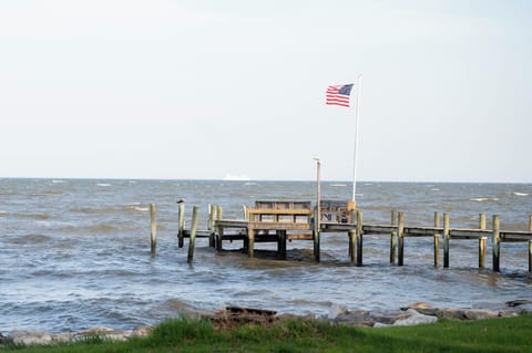 Steps from the water - this luxurious bayside cottage offers breathtaking views.