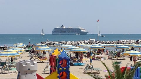 On the beach, white sand, 2 beach bars