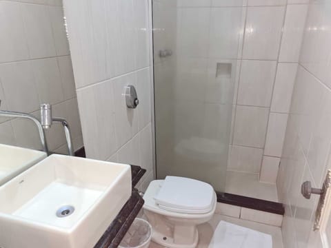 Economy Triple Room | Bathroom | Towels, soap, toilet paper