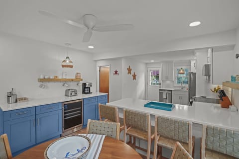 Full kitchen with 8 chairs with all tools needed for cooking a family meal