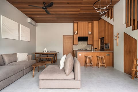 Deluxe Villa, Balcony, Pool View | Living area | 32-inch Smart TV with digital channels