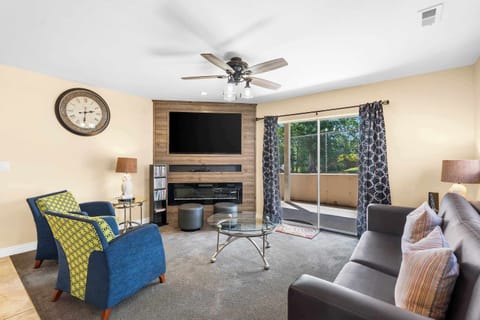 Unwind by the fireplace & stream your favorites on the living room smart TV