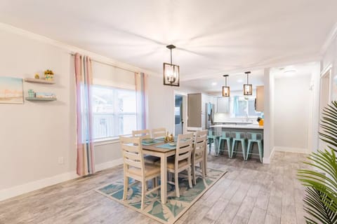 Appreciate the harmonious fusion of our kitchen/dining space from living room.