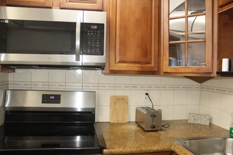 - Microwave, Dishwasher, Oven, and Refrigerator, Toaster and Electric kettle
