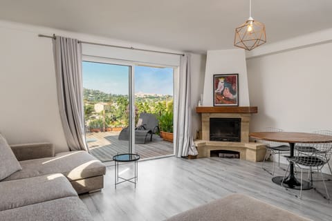 Deluxe Apartment, Multiple Beds, Terrace | Living area | 42-inch LED TV with digital channels, TV