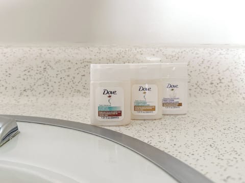 Combined shower/tub, towels, soap, shampoo