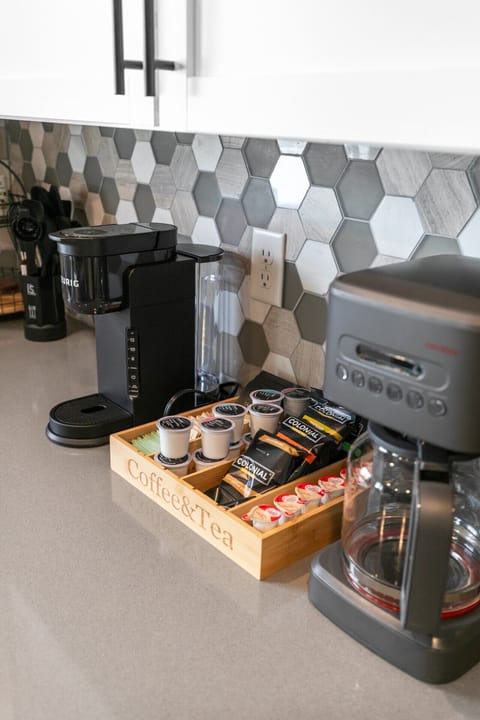 Brew your favorite cup with a Keurig and a coffee maker. We provide a starter set of ground coffee, k-cups, tea, creamer, sugar and stevia!