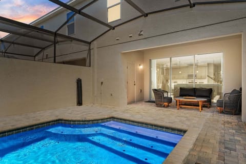 Enjoy lovely evenings outside by your private pool.