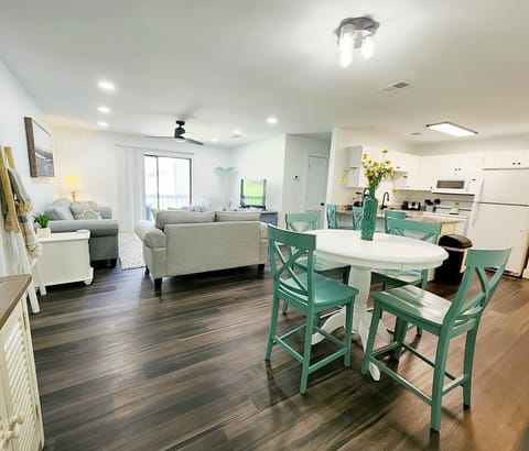 Open living room, dining and kitchen area