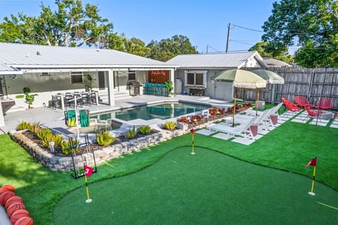 Putt-putt and other fun-filled games await beside the pool—where excitement and relaxation go hand in hand!