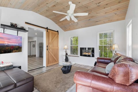 Signature House, Fireplace | Living room | 50-inch Smart TV with digital channels, fireplace
