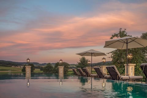 Outdoor pool, pool umbrellas, sun loungers