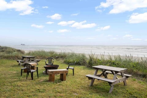 Enjoy a view of Twin Rocks from the beachfront yard.