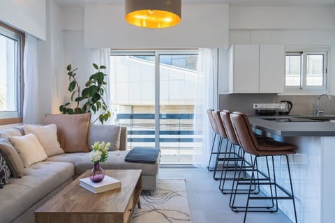 Deluxe Apartment, 1 Queen Bed with Sofa bed, Non Smoking, City View | Living area | Flat-screen TV