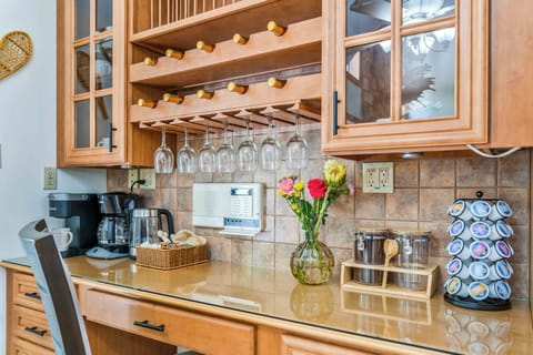 Start your mornings with a fresh cup from the fully stocked coffee bar, and wind down with a glass of wine from the built-in rack. With cozy seating, glassware ready to go, and both Keurig and drip coffee options, this stylish nook is perfect for your daily rituals—day or night.