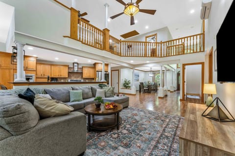 Centered around a cozy gas fireplace, this stylish yet comfy living room invites movie nights, game time, or deep conversation with your favorite people.