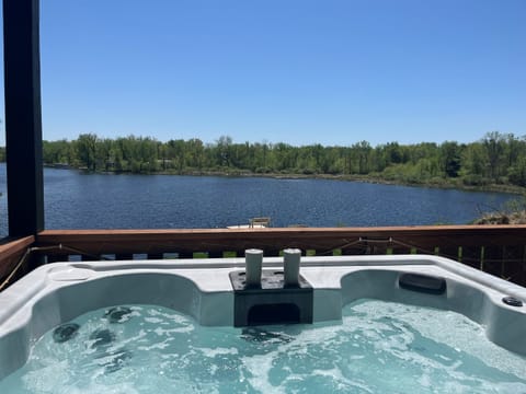 Our 2 treehouses are walking distance from each other and sit on 10 acres of private land. Treehouse 1: Treehouse on the Point (sleeps 6) has a hot tub that overlooks Lake Pokegama. Treehouse 2: Treehouse in the Bay (sleeps 10) has a sauna that seats 8