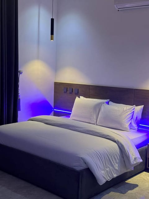 Deluxe Room, Balcony, City View | Desk, laptop workspace, blackout drapes, soundproofing
