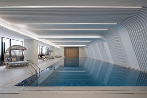 Indoor pool, open 7:00 AM to 11:00 PM, lifeguards on site