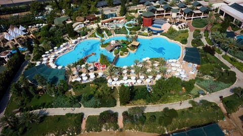 2 outdoor pools, open 7:00 AM to 8:00 PM, pool umbrellas, sun loungers