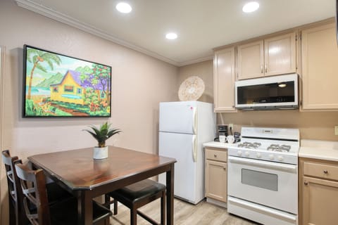 Start your mornings right — cozy kitchen with a coffee machine ready to brew.