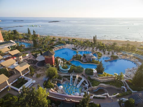 Indoor pool, seasonal outdoor pool, pool umbrellas, sun loungers