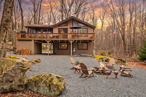 Cozy cabin retreat nestled in the woods—your perfect escape in every season.