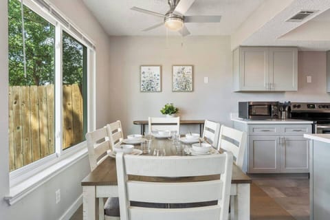 Dining area seats 6 and has easy access to kitchen and living area