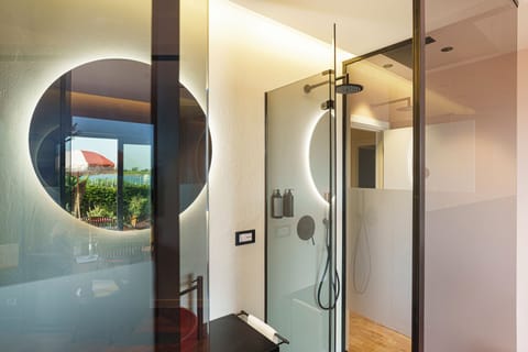 Deluxe Double Room, Courtyard View, Garden Area | Bathroom | Hair dryer, towels, soap, shampoo