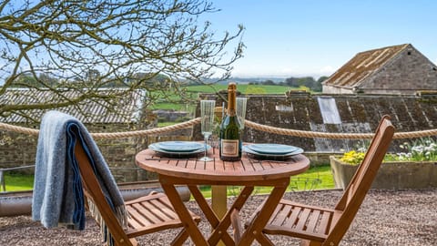 A lovely alfresco dining space awaits