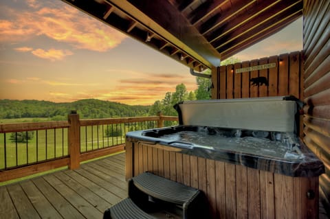 Soak in the hot tub, as you watch the sun sink over the Georgia Mountains