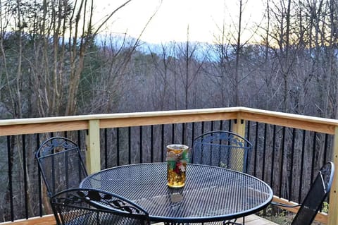 Sip drinks while soaking in stunning mountain views from your private outdoor space!