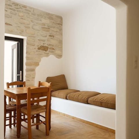 Traditional Living Room Area – Bright and airy space with simple island-style furnishings.