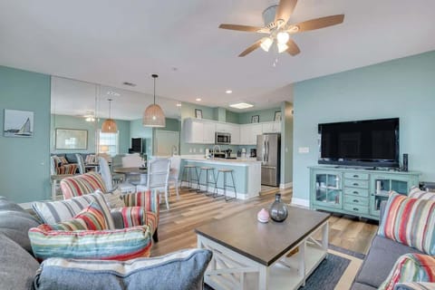 Seaside Escape - Soft tones and natural textures bring the beach inside in this beautifully blue living room. 