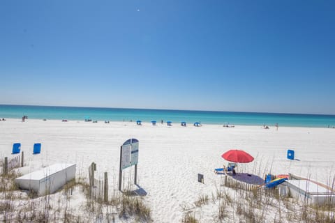 On the beach, white sand, sun loungers