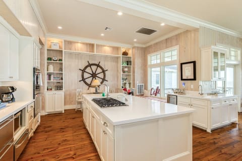 Fully stocked sparkling kitchen with modern appliances