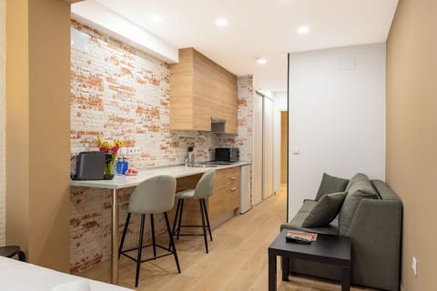 Deluxe Studio, Balcony | Private kitchen | Fridge, microwave, stovetop, coffee/tea maker