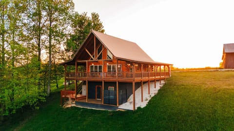 Catch a glimpse of sunset from this amazing Red River Gorge cabin that sits on 7 acres of land.