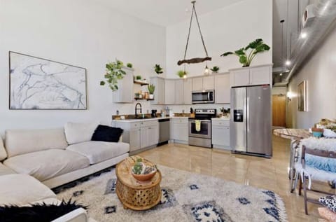 View of the kitchen/ living / Dining room facing the door 