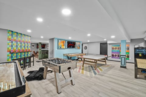 Grab a paddle before someone else does. Foosball, ping pong, shuffleboard, and arcade cabinets are all in one room, where your group will disappear for hours.