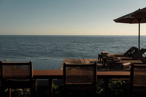 Outdoor pool, pool umbrellas, sun loungers