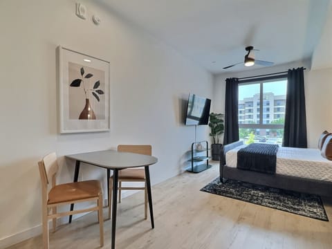 Enjoy your meals in this bright and inviting dining space, perfect for a short-term rental.